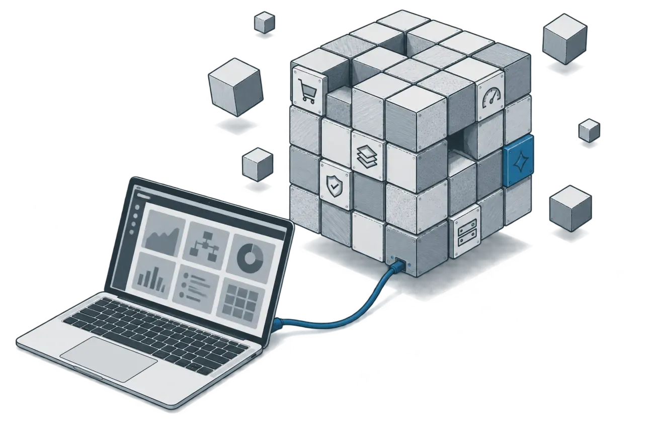 A cube built from many small metal blocks, six of its faces stamped with a trolley, layers, a gauge, a shield, a server and a spark, a few blocks detached and floating free, joined by one cable to an open laptop